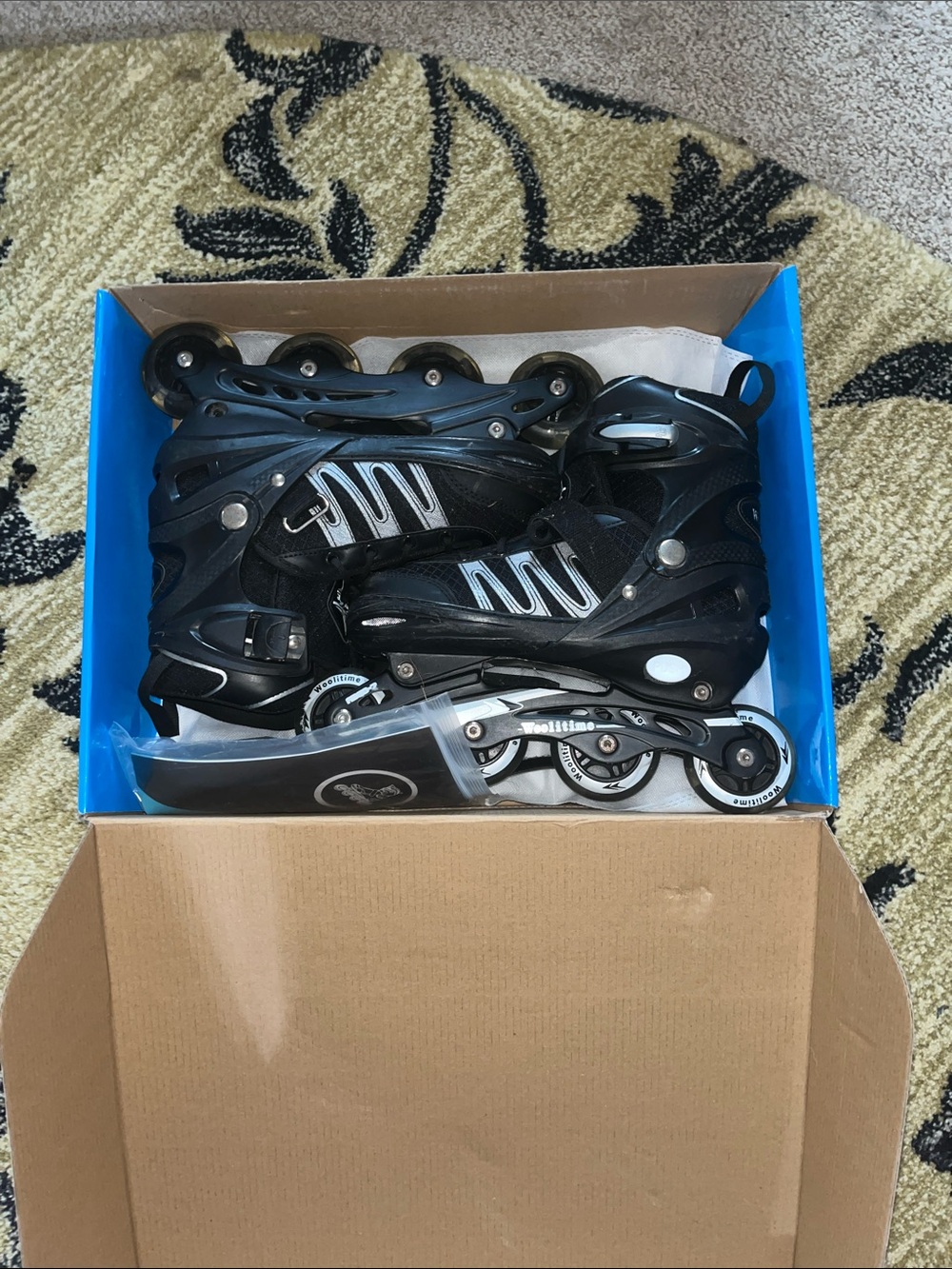 Adjustable Black Inline Rollerblades with Silver Accents